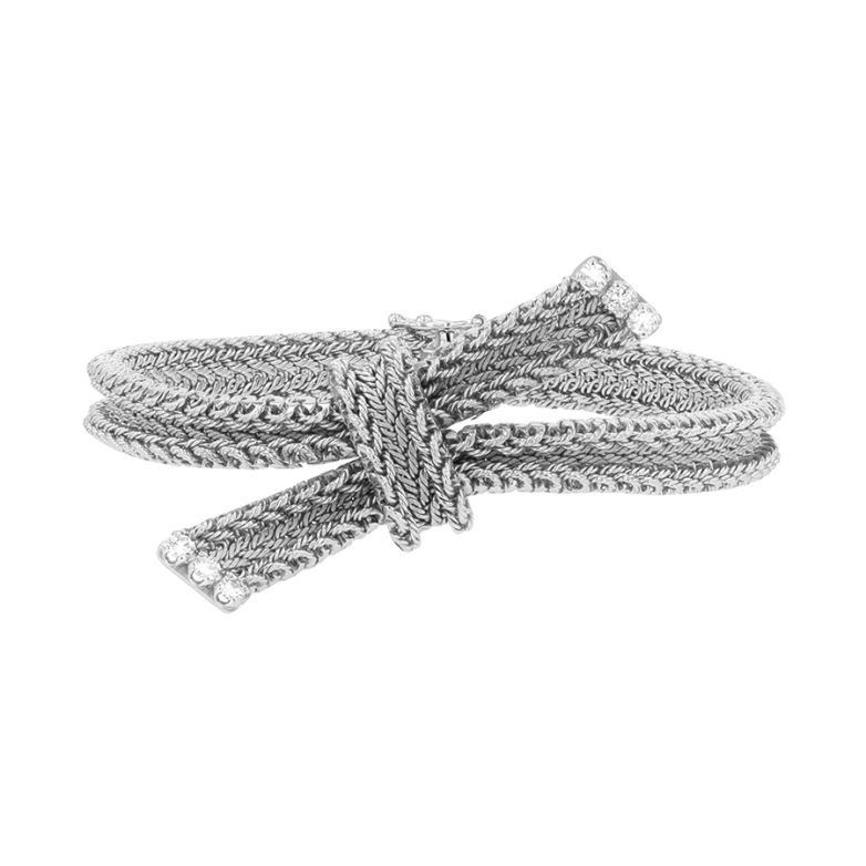 Acheter Bracelet vintage noeud diamants 0.18 carat or blanc 30.94g Comme neuf - 5600,00 € Bracelet vintage noeud diamants 0.18 carat or blanc 30.94g Comme neuf - reconditionné disponible sur Gemme Les Bijoux